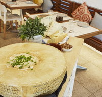 Flaming Cheese Wheel and Wine Experience Dee Why - Sydney Tourism