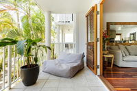 Stylish Tropical Oasis Apartment with Hot Tub and Four Pools